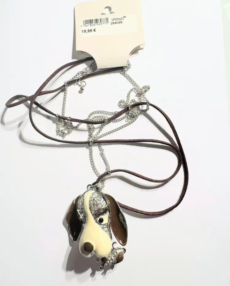 Necklace made of a leather cord, featuring a cute dog design crafted from glitter stones, in a hippie style.