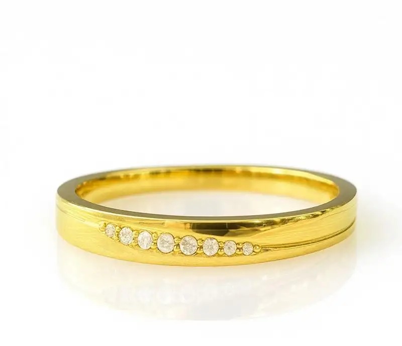 Gold-plated surgical steel ring with PST975 cubic zirconia