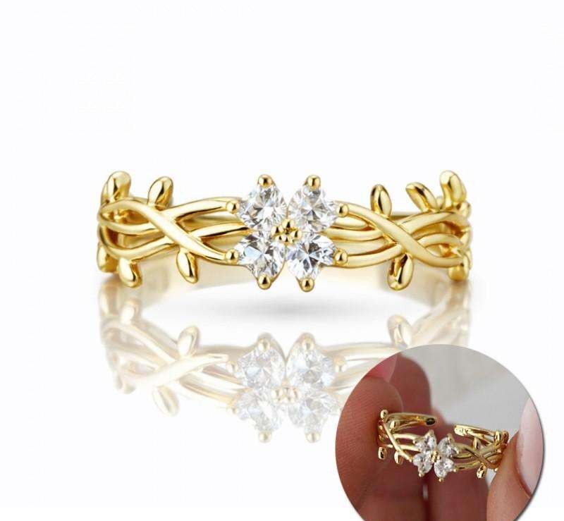 Ring made of surgical steel plated with 14k gold, braided, FLOWER cubic zirconia PST999